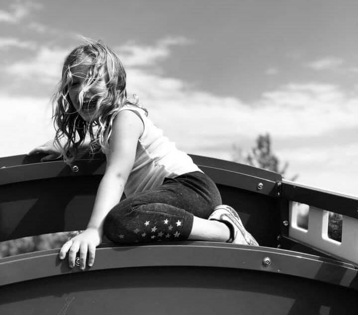girl playing on playground