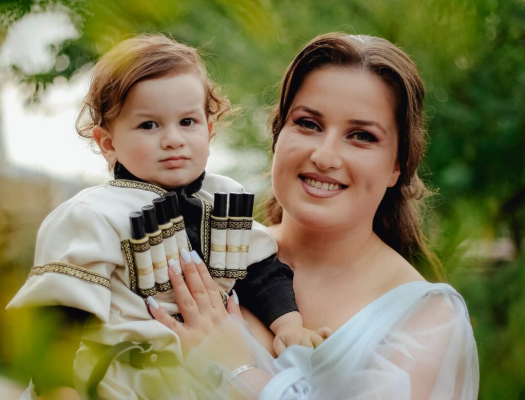 mother and baby with essential oils